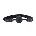 Full front view of berlin baby lace ball gag purple and black 