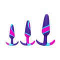 picture of the three sizes of the booty spectrum silicone butt plug set