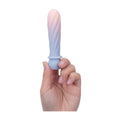 Symba bullet held in finger tips showing size