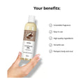 Woman holding coconut massage oil bottle with list of features