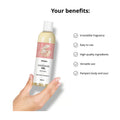 list of features for satisfyer neutral massage oil. bottle held in womans hand